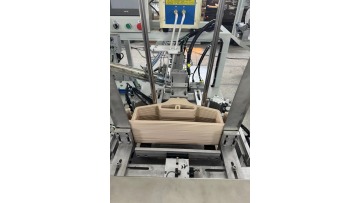 The machine is used for the plastic hangers to insert the metal hook