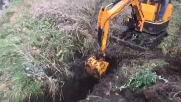 mini excavator digging work