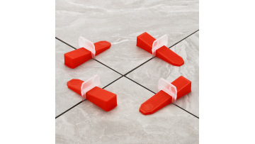 Tile laying and leveling process