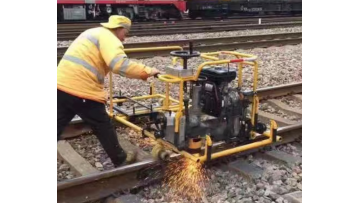 Railway rail grinding machine