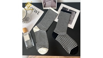 Korean black and white striped mid length sports socks