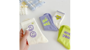 Korean version colored letter tube socks with smiling face and sporty style