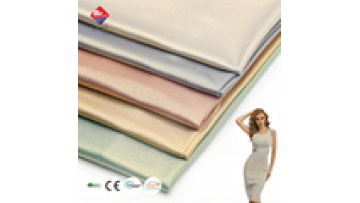 Custom Satin Shinny Knit FDY Fabric Crystal Laser Holographic Pleated Gold Stamping Iridescent Fabric for Dress1