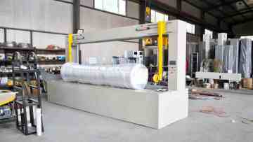 Cylindrical radial wrapping machine
