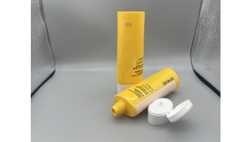 yellow oval sunscreen cosmetic tube