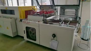 The Automatic Vertical L bar sealer to pack the paper rolls.