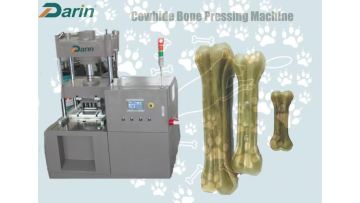 Rawhide bone pressing machine.mp4