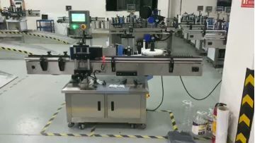Automatic vertical labeling machine for round bottles