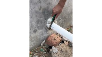 Green and black tube cutting knife