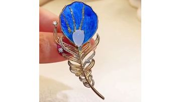 Intangible cultural heritage hand - made flannel flower blue feather brooch