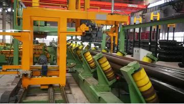 Steel pipes strapping machine