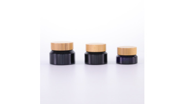 Black oblique shoulder cream jar with bamboo lid