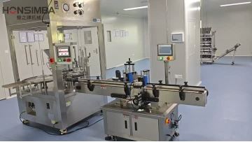 Vial filling, capping and labeling machine