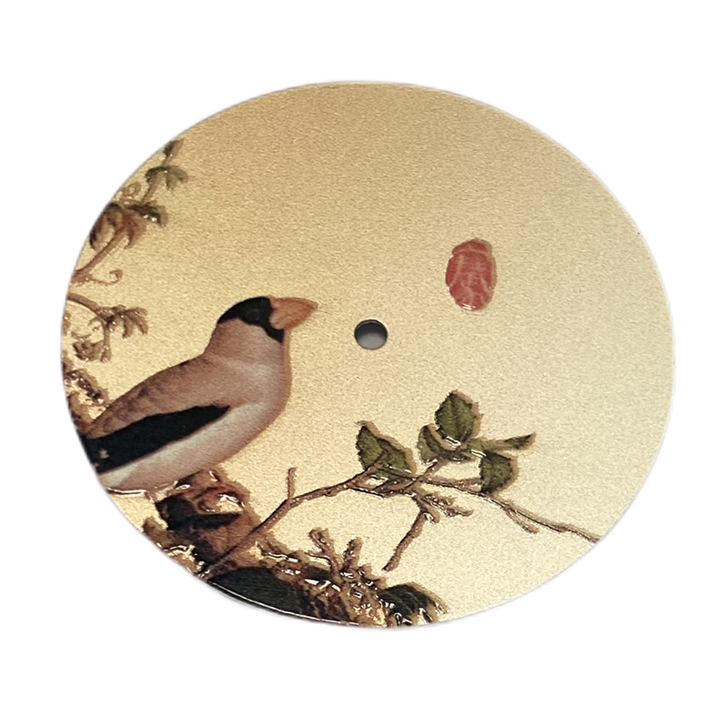 Bird and flower on dial
