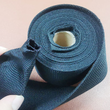 Wear resistant heat shrink fabric sleeve
