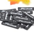 KALASO Wholesale 30pcs Black Handmade Labels Clothes Garment PU Leather Labels Hand Made Tags Jeans Bags Shoes Sewing Supplies