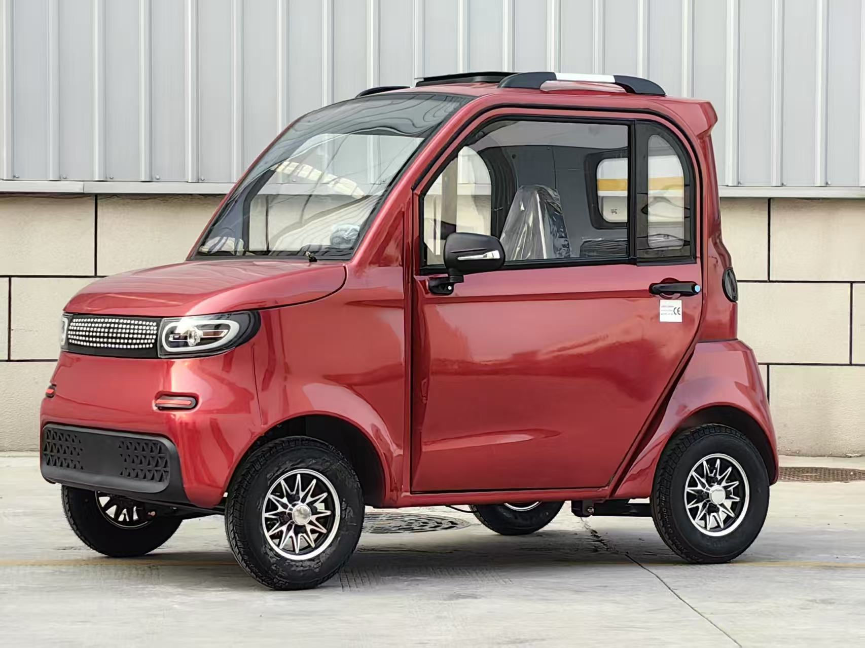 Surpass two-door, four-wheel fully enclosed electric vehicles
