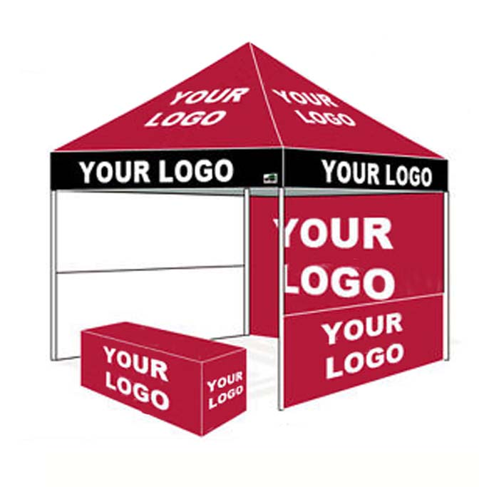 Trade Show Tent With Flags And Table Cloth