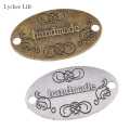 Lychee Life 50pcs Alloy "handmade" Letter Labels DIY Apparel Accessories Sewing Decoration Craft Garment Tags