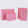 10pcs / pink paper bag holiday gift clothing gift packaging shopping bag belt support printing 1 color simple logo