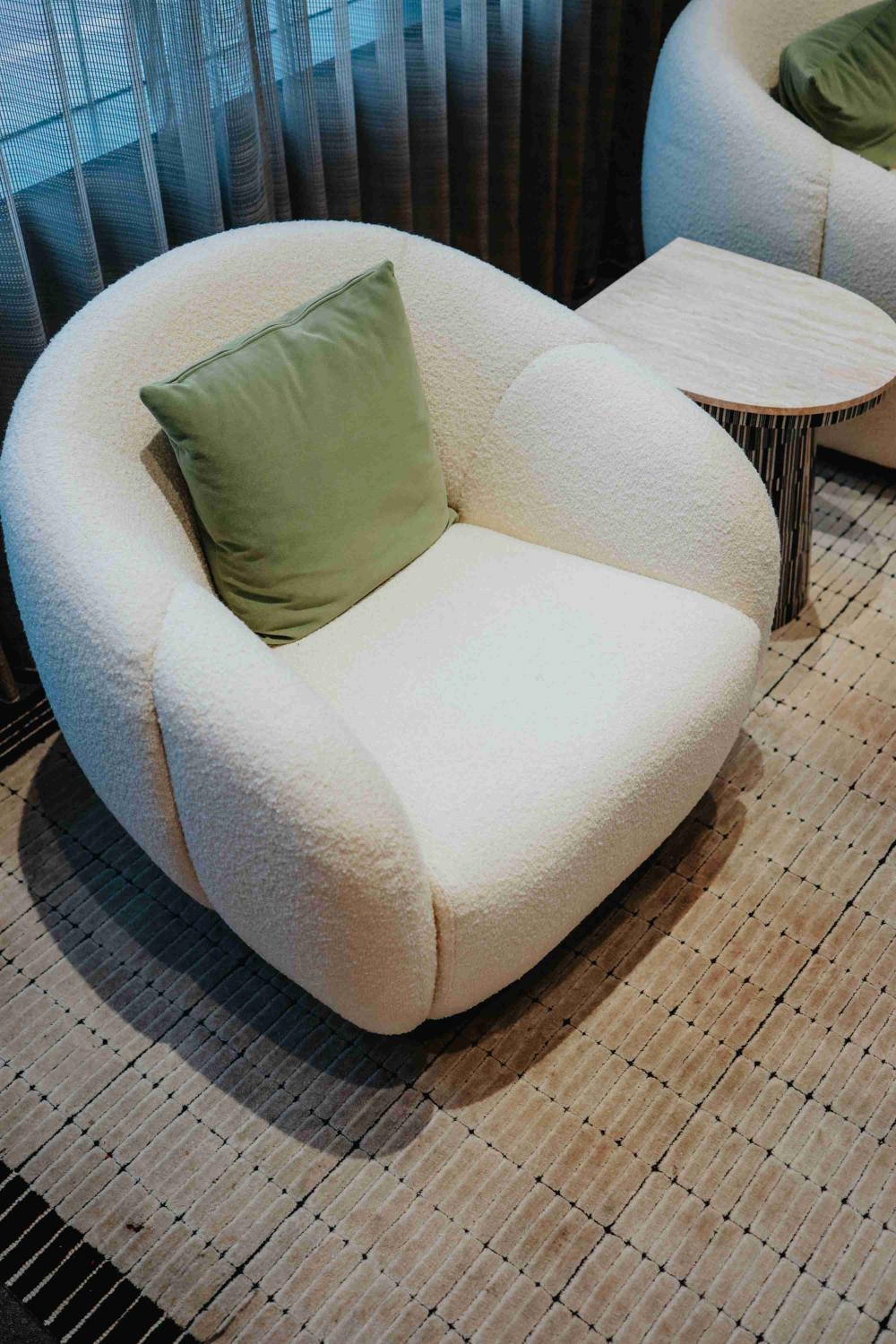 Chic Designer Armchair with Unique Curved Design
