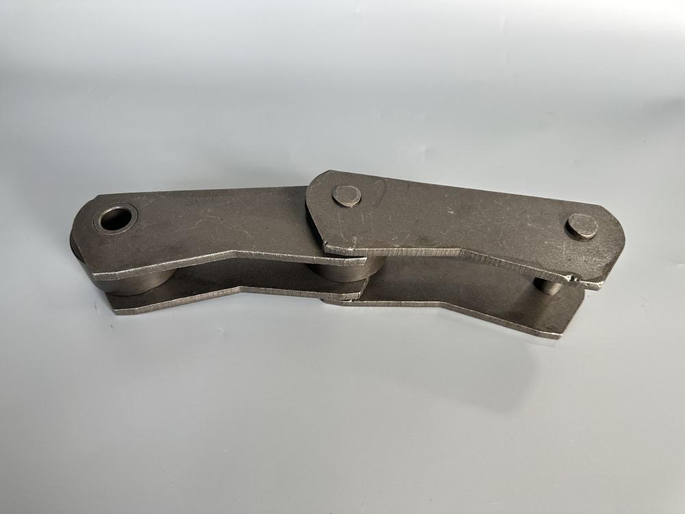 Cooling bed conveyor chain