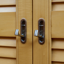 White wooden paulownia shutters