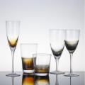 Gradient amber color glass drinkware set with the ribbed design on bottom