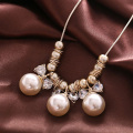 https://www.bossgoo.com/product-detail/champagne-pearl-rhinestone-sweater-chain-lovely-44473796.html