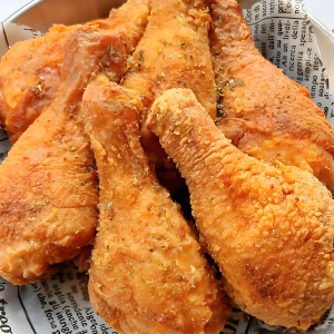 Fried chicken legs wrapped in breadcrumbs