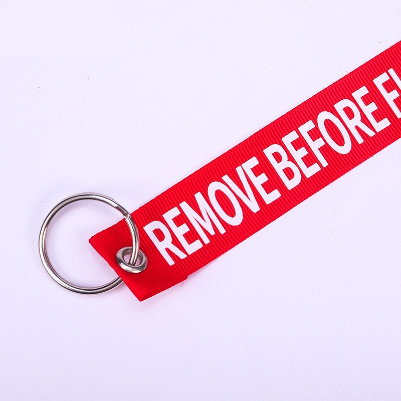 2020 New Fashion Motorcycle Ribbon Keychain Remove Before Flight Exhaust Pipe Plug Ribbon Key Ring Chaveiro Red Print Keychains