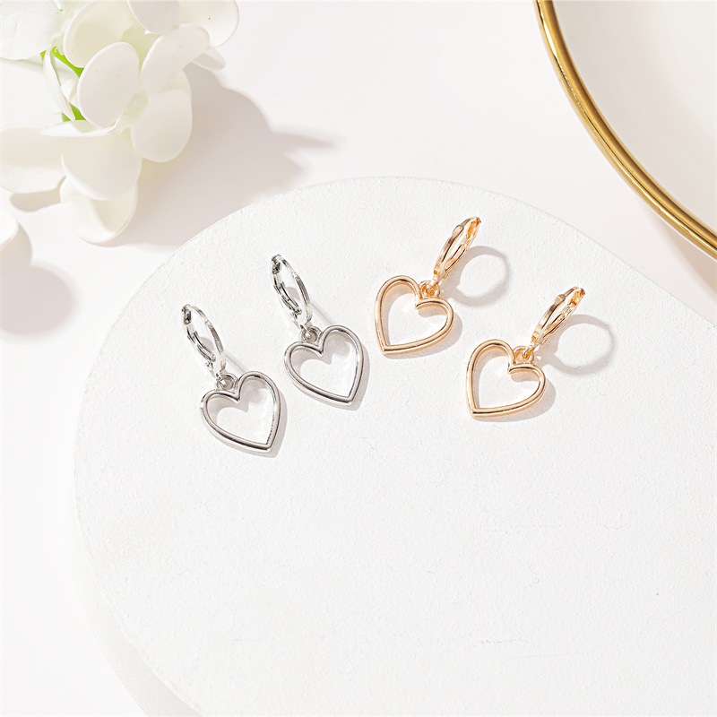 Simple hollow love earrings small fresh wild metal peach heart earrings