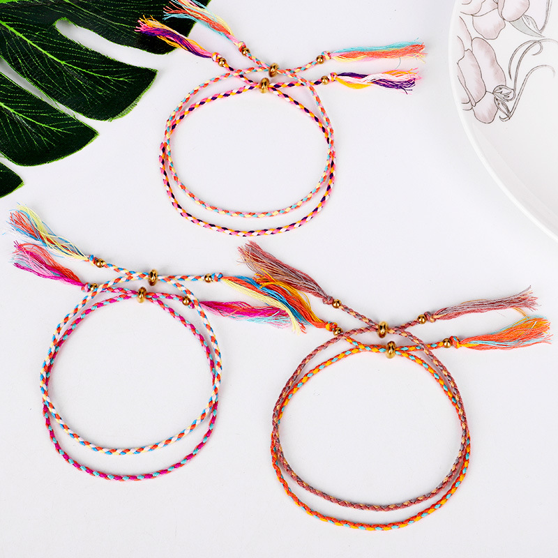 Jewelry writing and playing hand twisted thread bracelet Tibetan cotton copper Bead Tassel hand rope adjustable