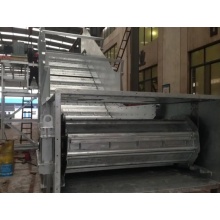 Slat conveyor with incline