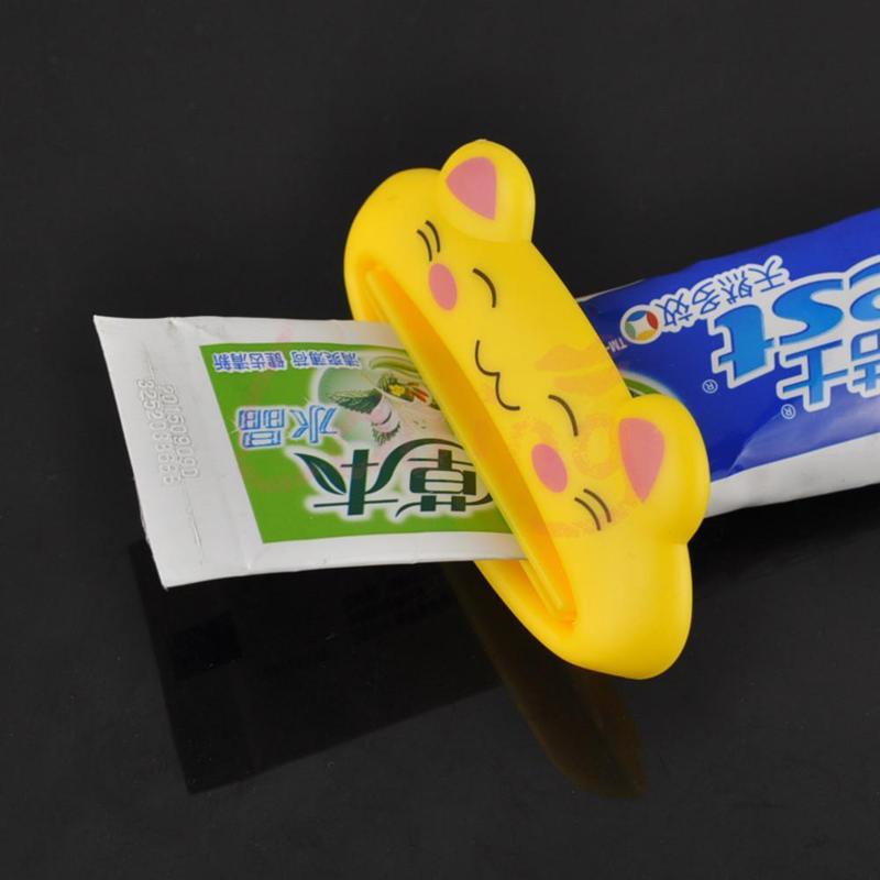 1pcs Cartoon Toothpaste Tube Dispenser Squeezer Rolling Holder Animal Tooth Paste Tube Squeezer Toothpaste Holder Supplies