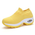 Yellow tennis shoes