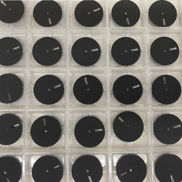 blank watch dial on the tray