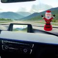Professional Solar Innovative Swing Doll Moving Head For Christmas Santa Claus Gift Car Decoration Interior Doll