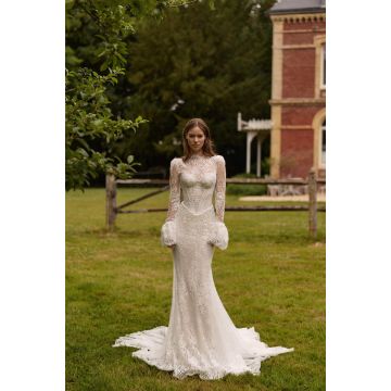 Strapless mermaid wedding gown fashioned from delicate chantilly lace