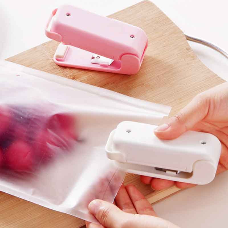 Mini sealing machine snack plastic bag sealing machine household hand pressure heat sealing machine small sealing machine