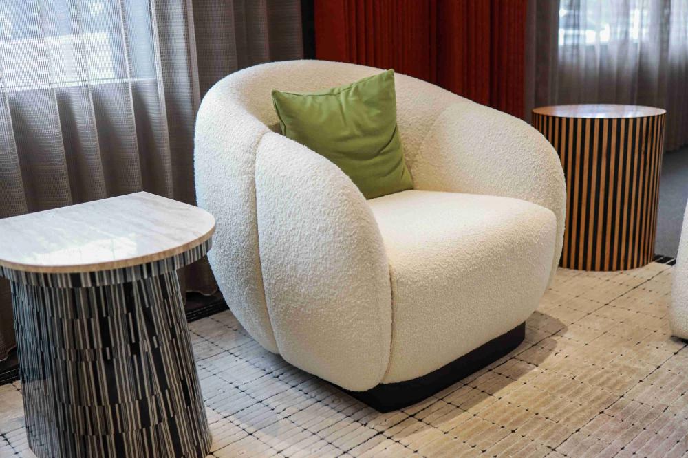 Chic Designer Armchair with Unique Curved Design