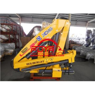 Knuckle boom crane mounted on truck