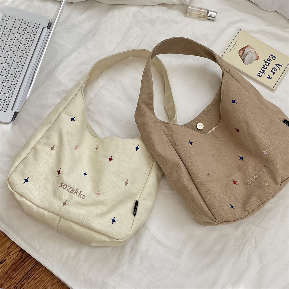 triple compartment shoulder bag