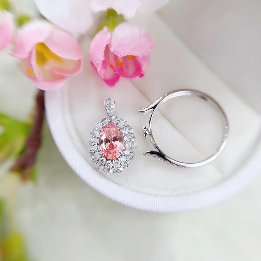 Oval pink diamond halo centerpiece with separate ring mount and pendant bail