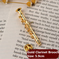 Gold Clarinet Brooch