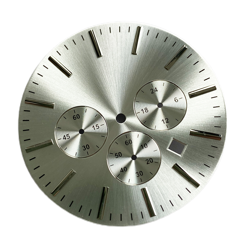 Man's watch dial with 3 small eyes