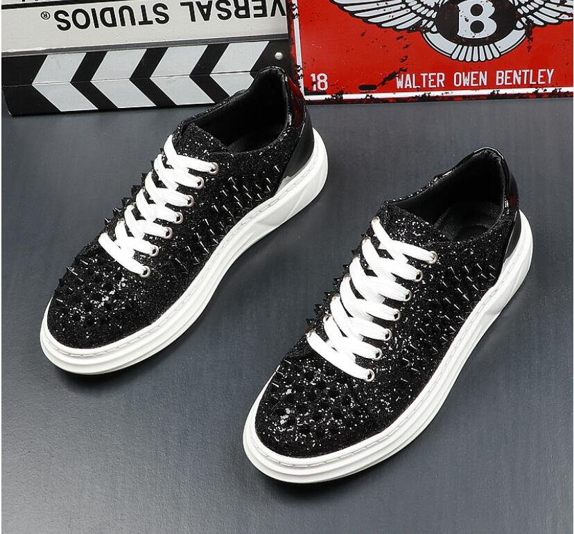 Trend rivet man shoes low upper shoes punk wind bright leather personality fashion board shoes thick sole lacing casual shoe man