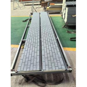 Metal Carved Panels With Water Patterns Covering Brick Patterns