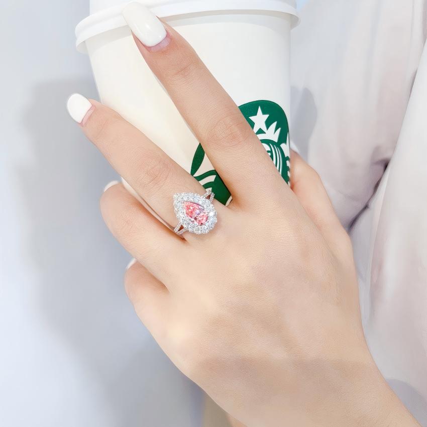 1.01 carat pear pink lab diamond convertible ring with double halo and split shank
