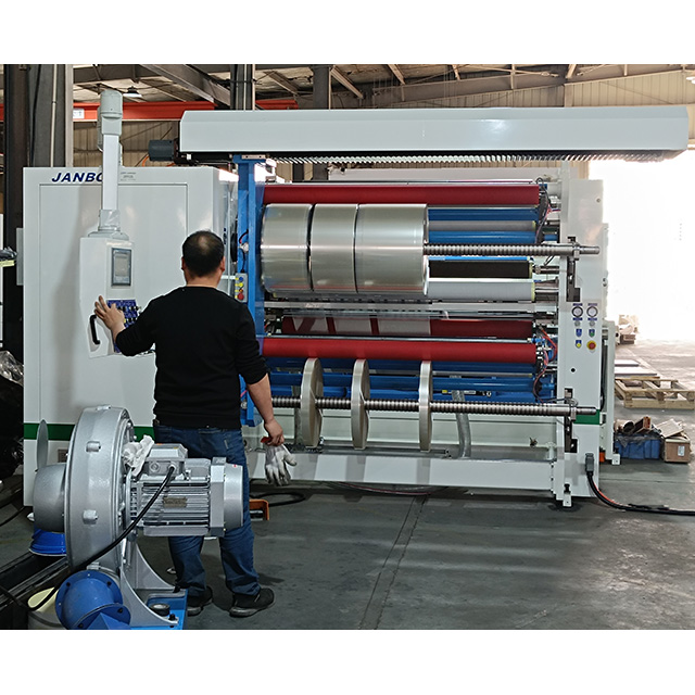 Double axis center rewinder